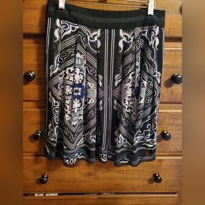 White House Black Market Pleated, Zips on side, white, black, and red.  Size 4